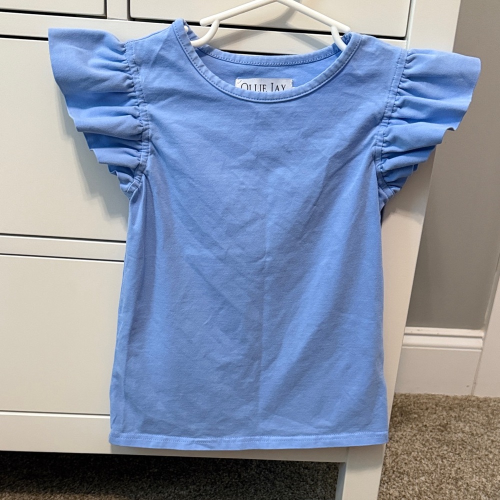 Ollie Jay Short Sleeve Ruffle Top in Sky Blue